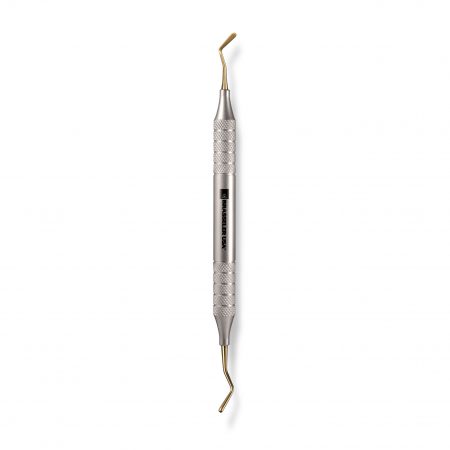 Universal dental composite instrument for bulk dental composite placement and adaptation in all classes of cavities. Titanium Nitride coated with #6 handle.
